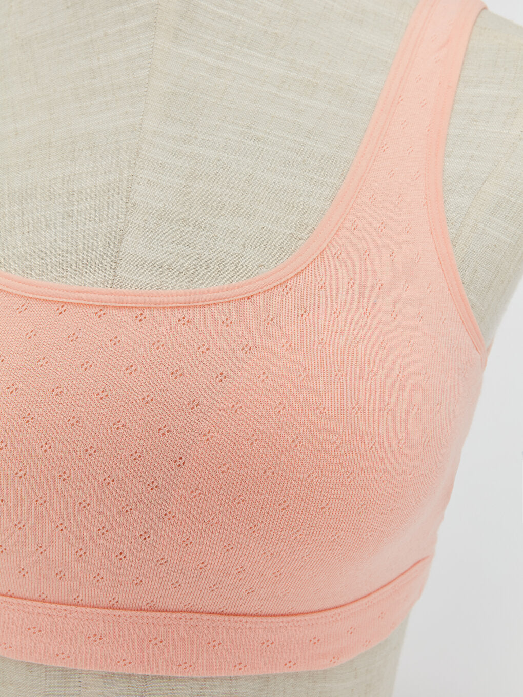 Non-wired, non-padded, self-patterned sports bra