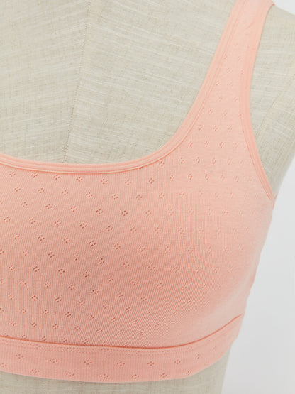 Non-wired, non-padded, self-patterned sports bra