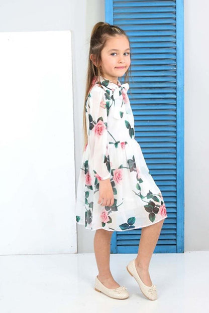 Girl's White Dress with Transparent Sleeves and Floral Pattern