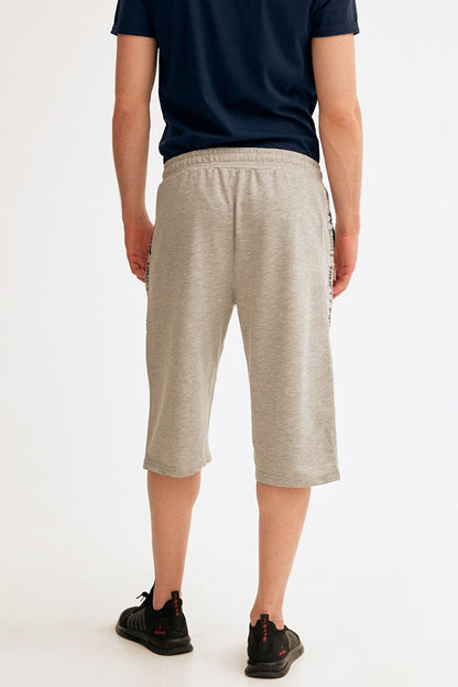 Capris with Text Printed on the Sides