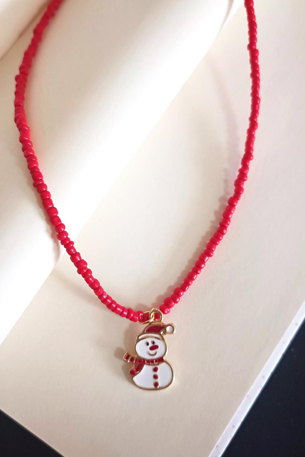 New Year's Red Beaded Necklace with Snowman Figure