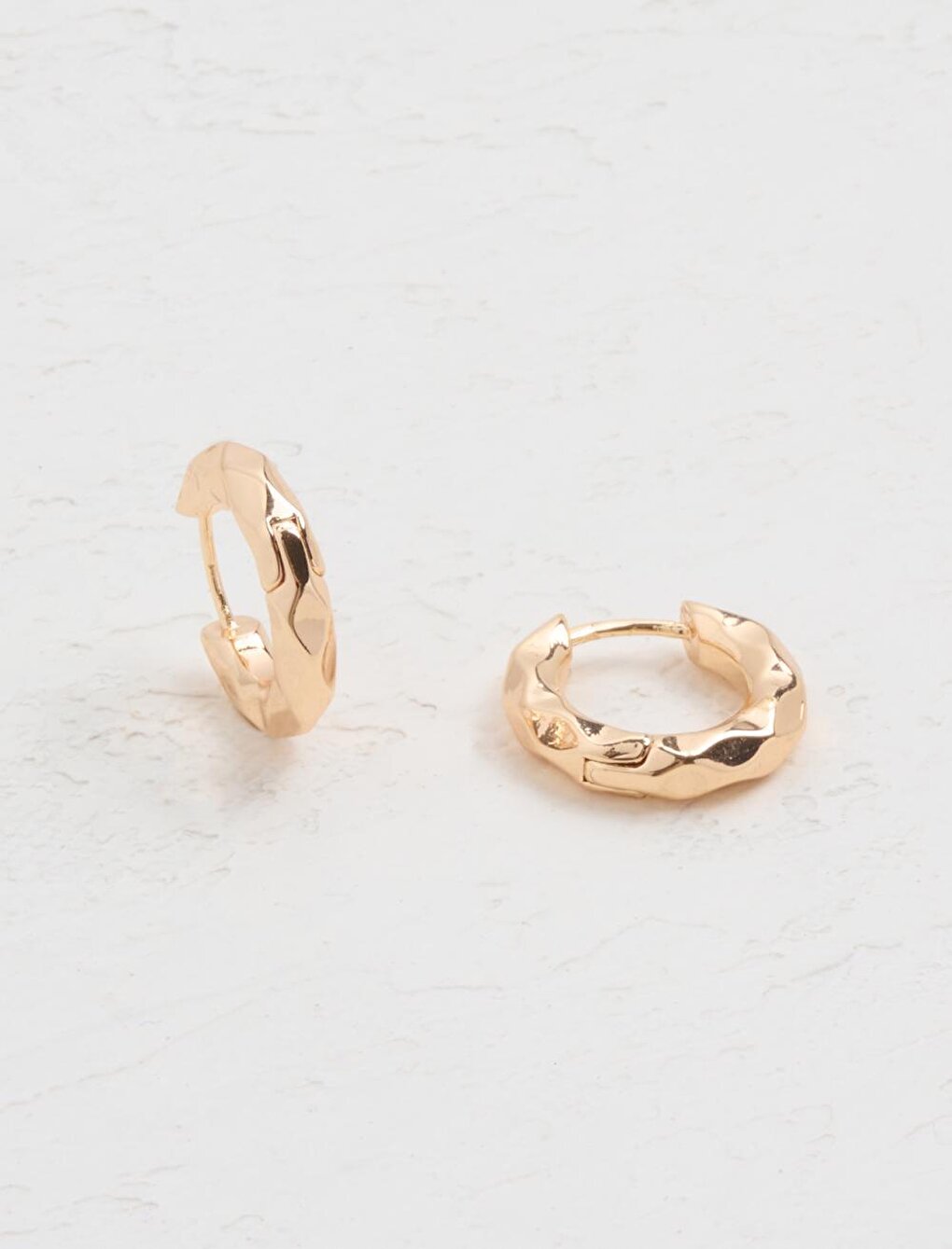 Gold Oval Surface Detailed Clip Earrings