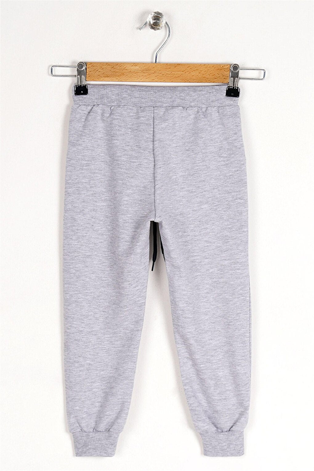 Boy's Gray Colored Looking Forward And Creating Printed Sweatpants