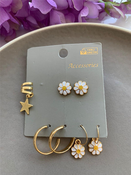 Set of 7 Earrings with Daisy Figure