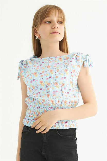 Girl's Blue Colored Floral Patterned Zero Sleeve Blouse