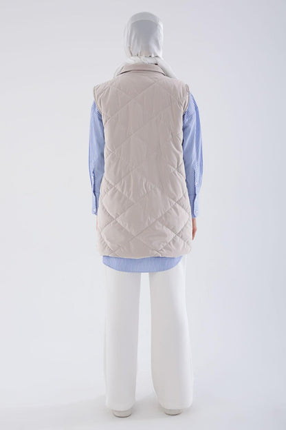 Quilted Puffer Vest with Stone Snaps and Zipper