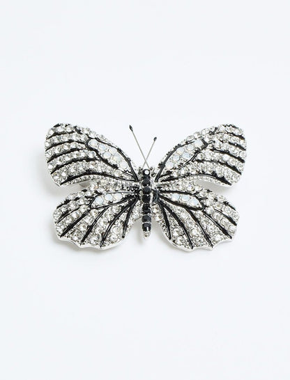 Elegant Shiny Stone Brooch with Silver Butterfly Figure