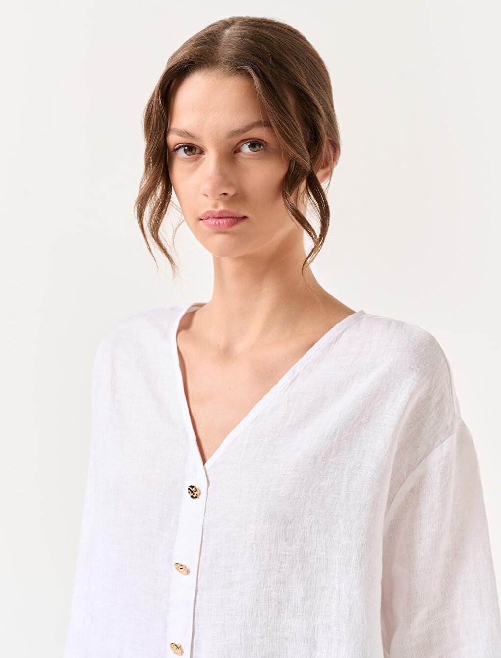 White Three Quarter Sleeve V Neck Linen Blouse