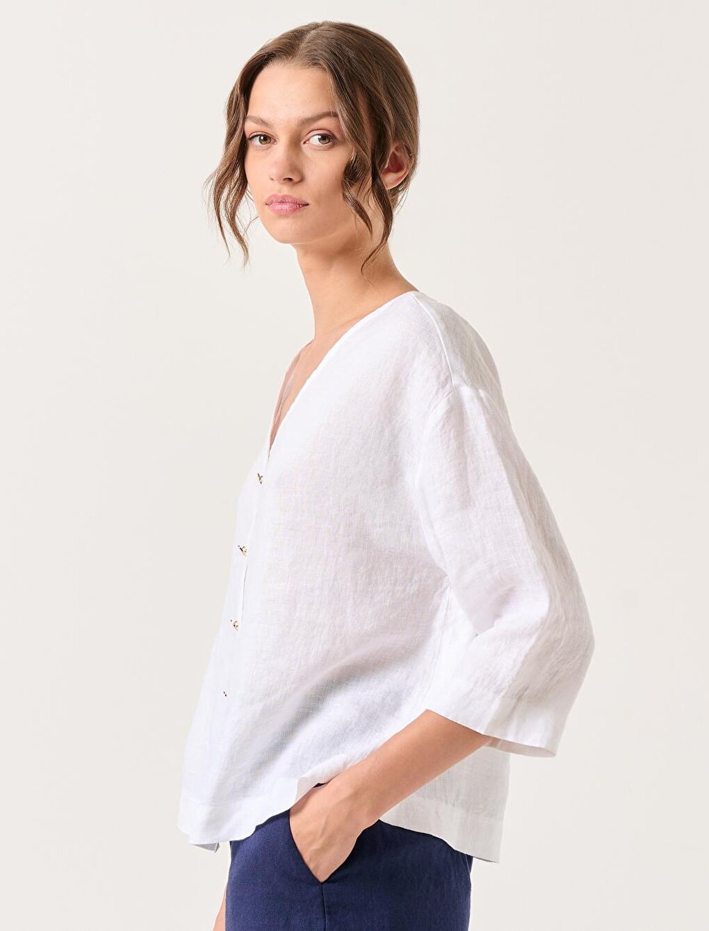 White Three Quarter Sleeve V Neck Linen Blouse