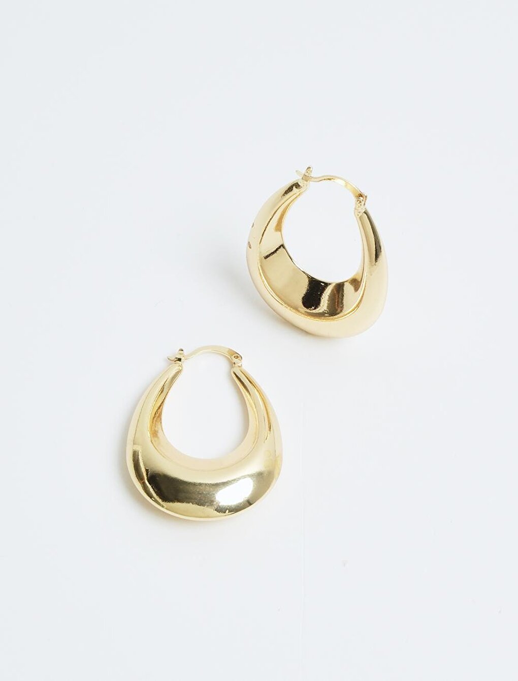 Gold Oval Stylish Clip Earrings