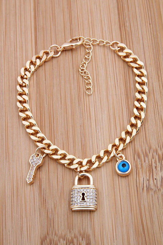 Gold Bracelet with Nazarboncuk Zircon Stone and Lock and Key Figure