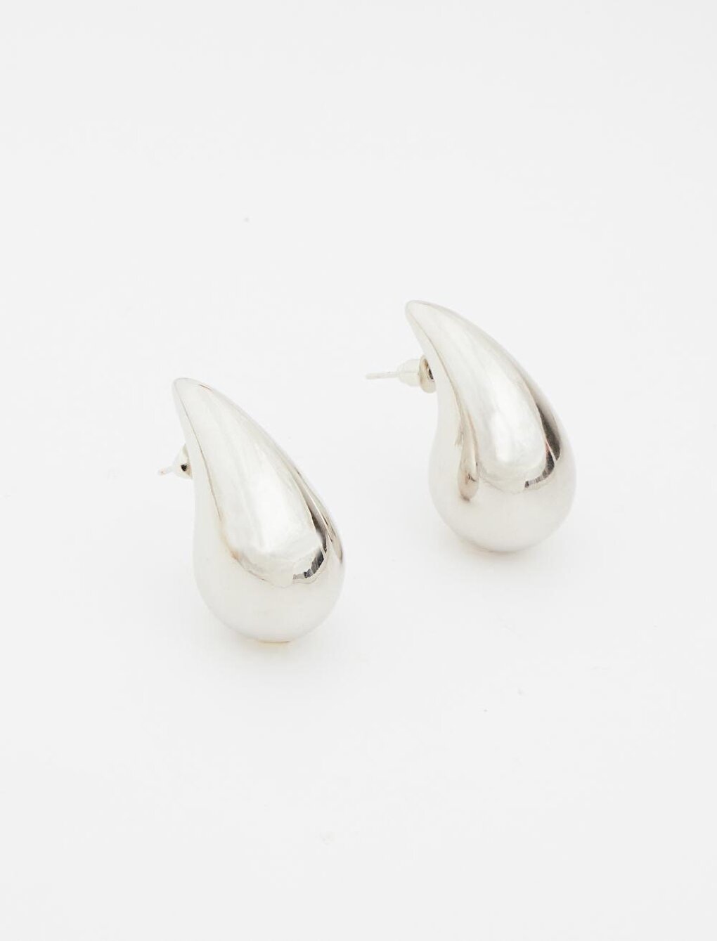 Stylish Earrings with Silver Drop Figures