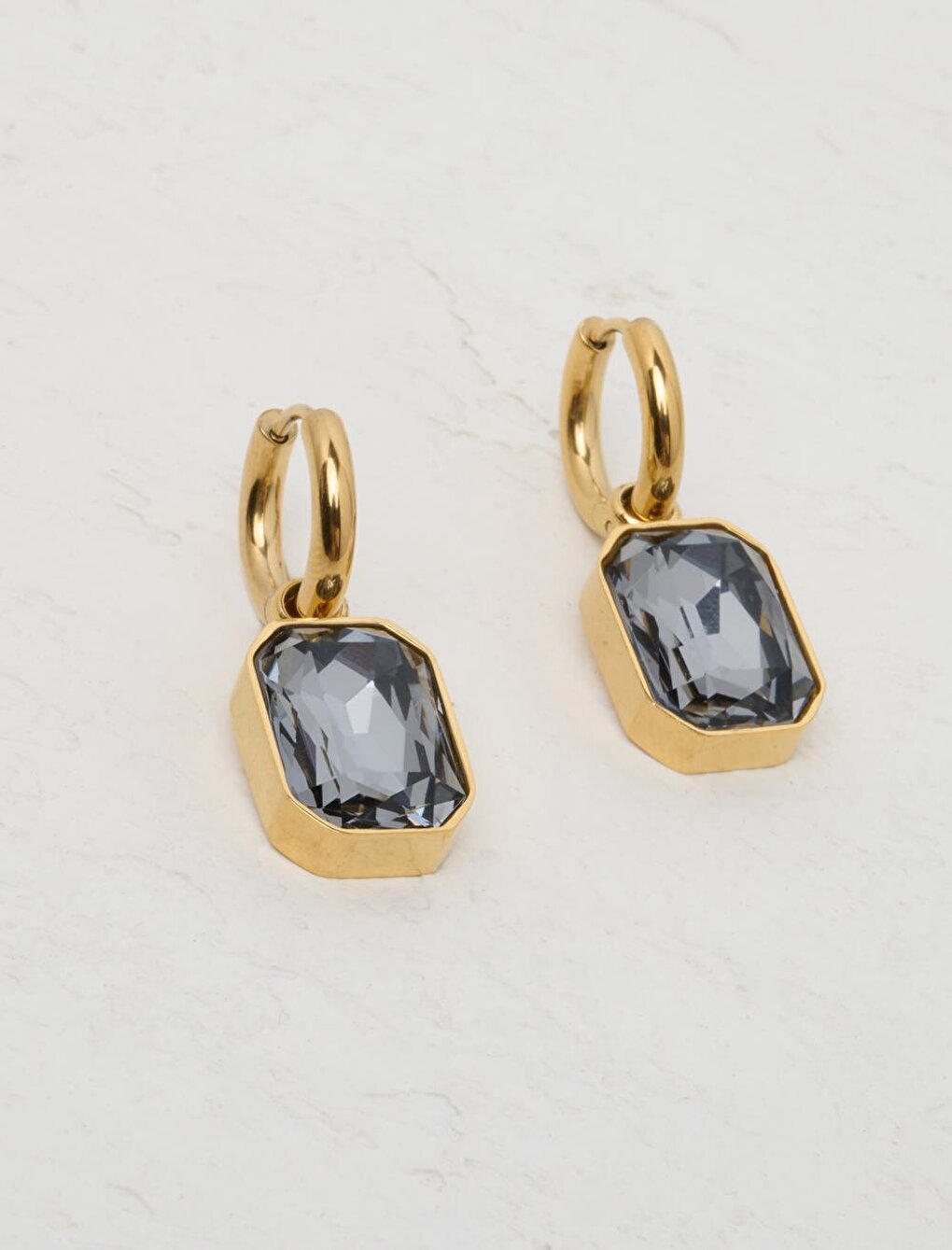 Stylish Dangle Earrings with Dark Blue Stone Figures