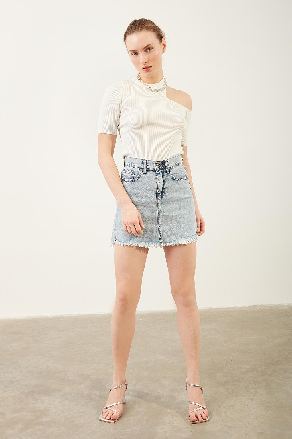 Tasseled Mini Jean Skirt