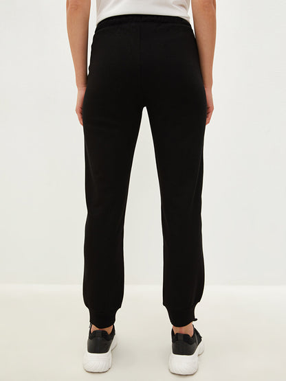 Women's Sweatpants with Elastic Waist and Flat Pocket Detail