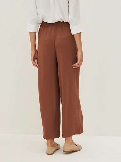 Elastic Waist Loose Fit Women's Palazzo Pants with Pocket Detail