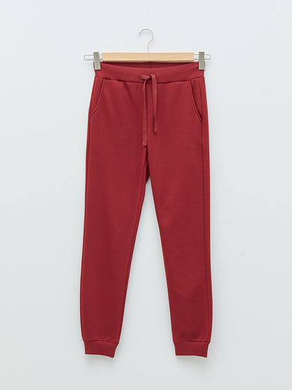 Women's Sweatpants with Elastic Waist and Flat Pocket Detail