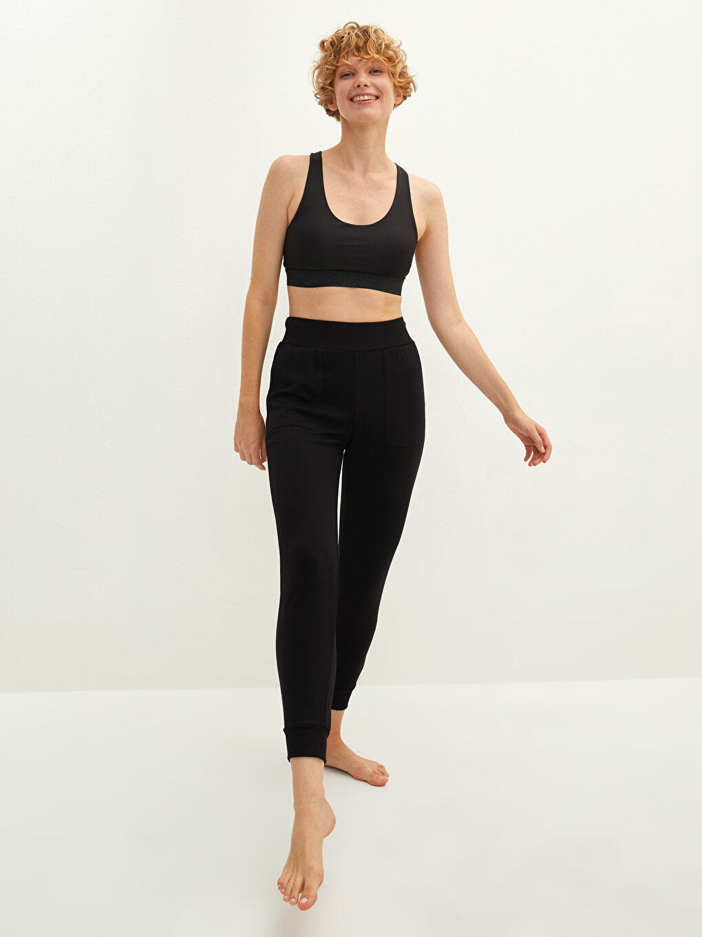 Women's Sports Sweatpants with Elastic Waist and Flat Pocket Detail