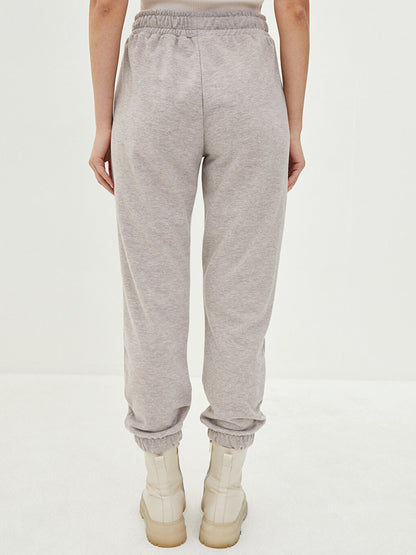 Women's Jogger Sweatpants with Elastic Waist and Flat Pocket Detail