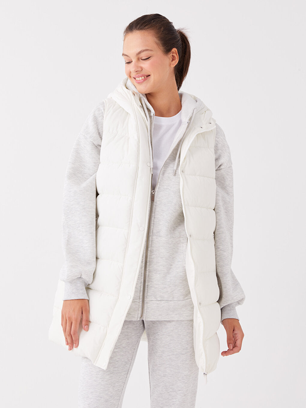 Hooded Women's Puffer Vest with Flat Pocket Detail